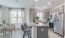 a kitchen island with stools