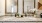 bathroom with a double vanity and two large mirrors